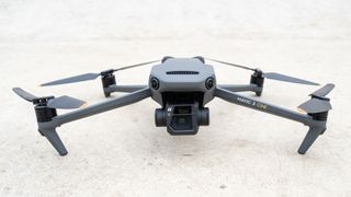 The DJI Mavic 3 drone on a stone floor
