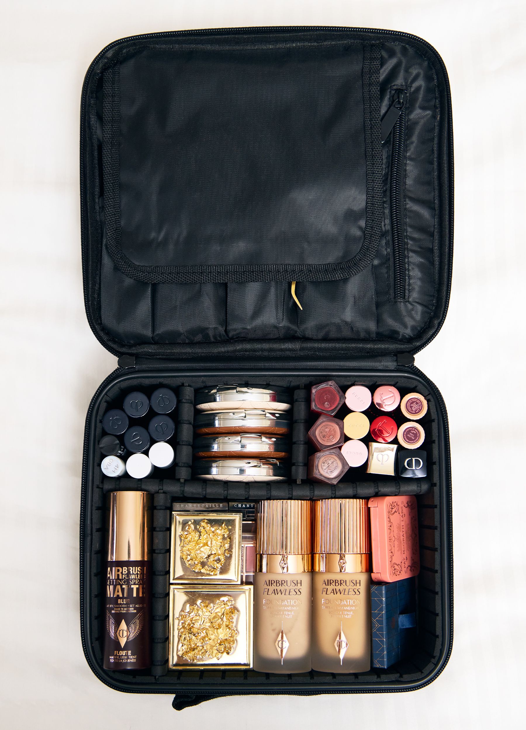 A bag containing Sophie Telegadis's makeup essentials featuring Christian Dior products.