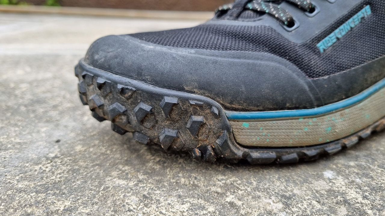A close up of the reinforced toe with tread pattern