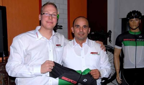 Team manager Geoffrey Coupe and Algerian Cycling Federation president Rachid Fezouine present the 2012 jersey