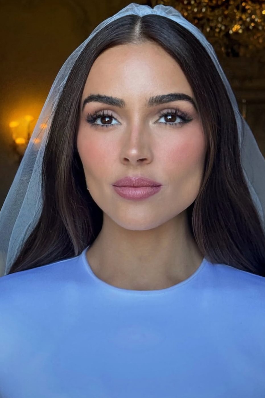Olivia Culpo showing off her wedding hairstyle.