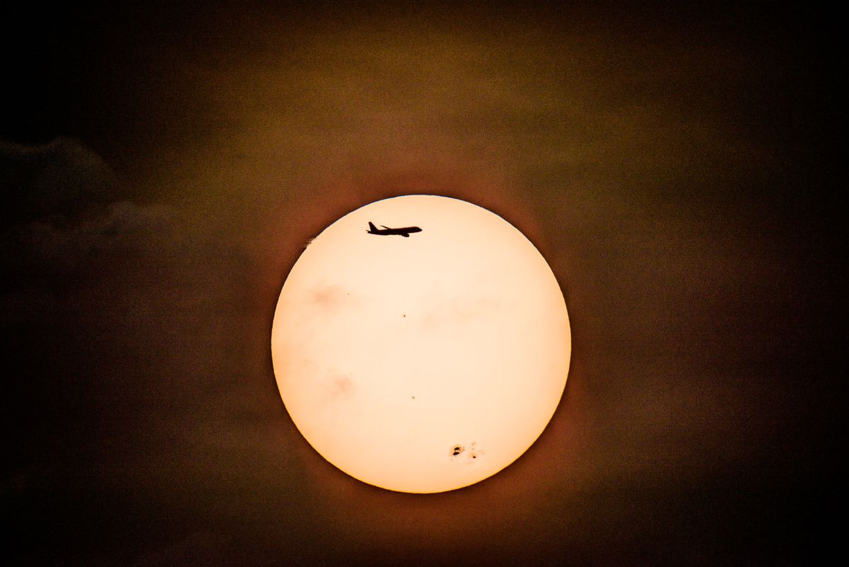 Astrophotographer Captures Stunning Image of Sunspot and Plane | Space