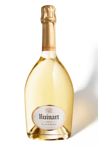 A bottle Ruinart blanc de blanc champagne