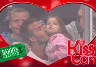 David Beckham kisses Harper on the KissCam