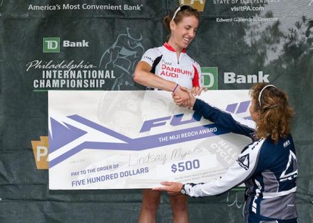 Winner of the Under 23 contest, Lindsay Myers (Danbury Audi), accepts the Miji Reoch Award check from Tracy Lea