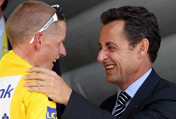 Rasmussen gets congratulations from French president Nicolas Sarkozy.
