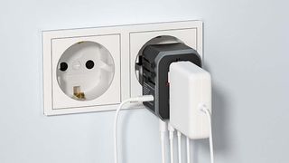 EPICKA Universal Travel Adapter in use.