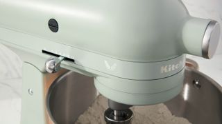 Close up of the trim on the KitchenAid Blossom stand mixer with botanical illustrations