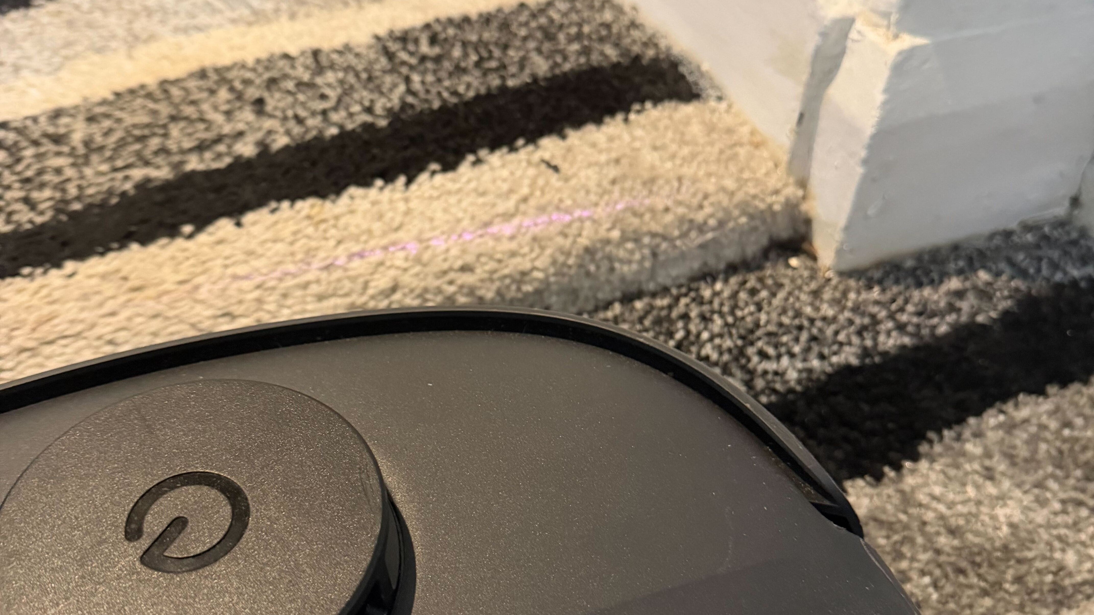 A robovac going up an edge