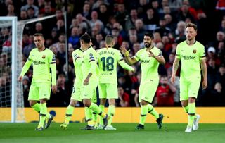 Barcelona’s Luis Suarez (second right) celebrates after Luke Shaw had deflected his effort home