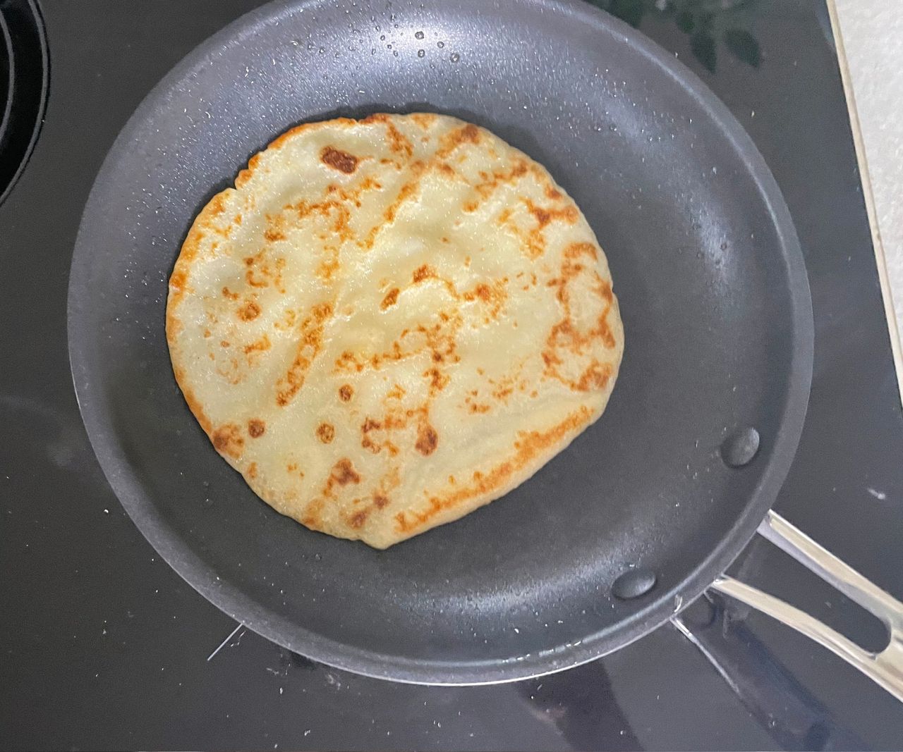 A pancake in the M&amp;S 5-piece Stainless Steel Pan Set saucepan