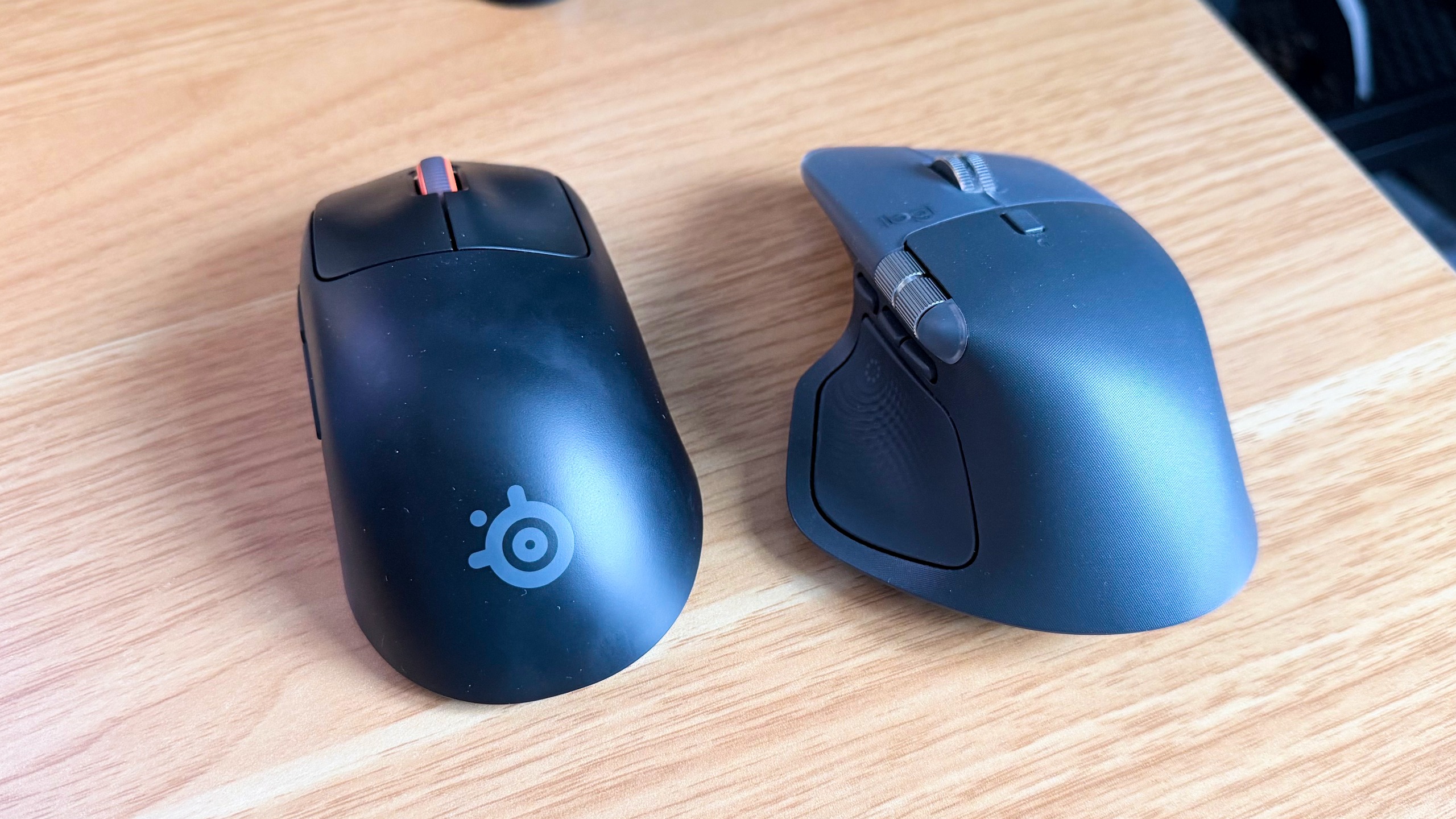 The SteelSeries Rival Pro next to the Logitech MX Master 4