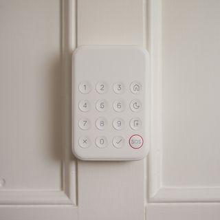 hive homeshield white control panel on panelled wall