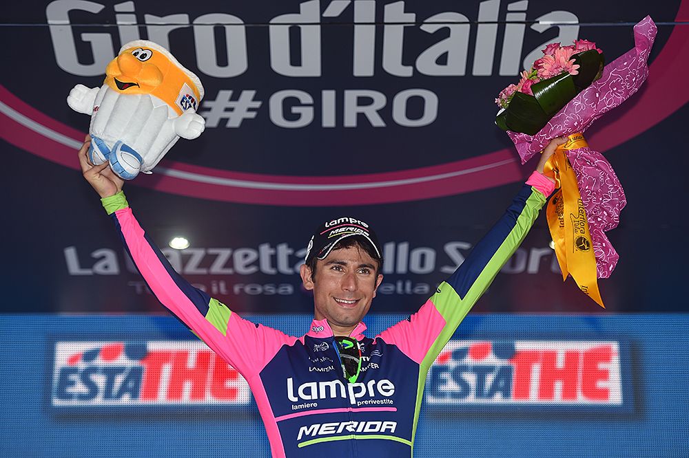 Diego Ulissi (Lampre-Merida) gives a victory salute on the podium