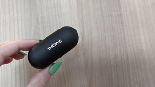 1More Evo review: holding closed true wireless earbud case