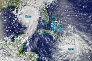 A NASA Earth Observatory image using data from several satellites shows the pair of tropical cyclones headed toward Louisiana and Texas Sunday (Aug. 23).