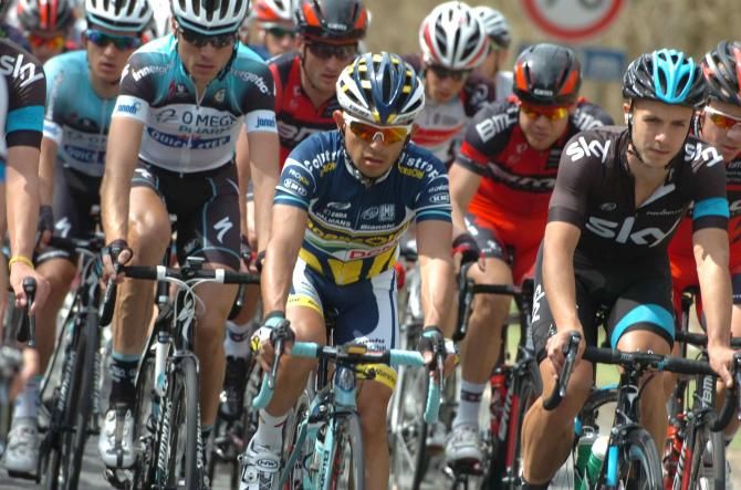 Jose Rujano (Vancansoleil-DCM) rides next to Jonathan Tiernan-Locke at Fleche Wallonne