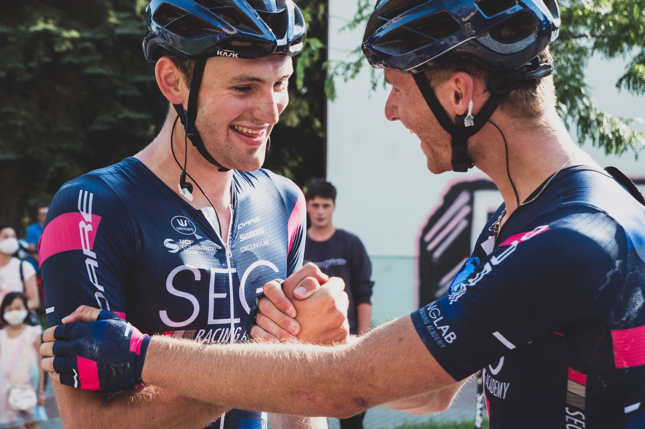 Jordi Meeus of SEG Racing Team congratulated by teammate for stage 2 win