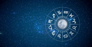 A circular chart with the 12 zodiac signs in white is against a night sky background full of stars