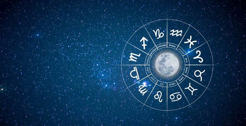 A circular chart with the 12 zodiac signs in white is against a night sky background full of stars