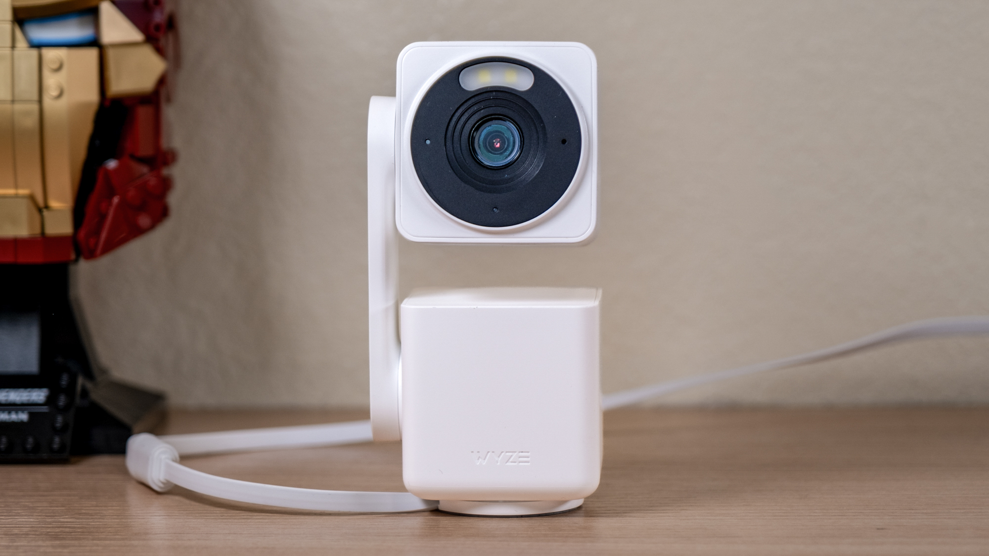 Front shot of a Wyze Cam Pan v4 on a desk