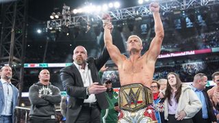 Cody Rhodes (R) and Triple H celebrate during Night Two of WrestleMania 40 at Lincoln Financial Field on April 7, 2024
