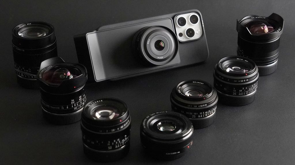 SwitchLens accessory, mounted to a smartphone, with a selection of lenses