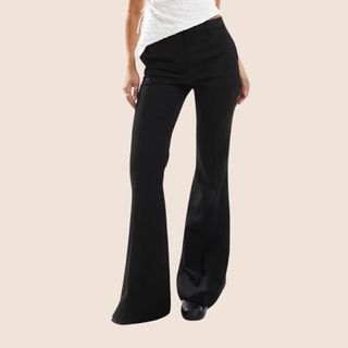 flat lay image of flared black trousers