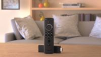 Amazon Fire TV stick in front of living room couch