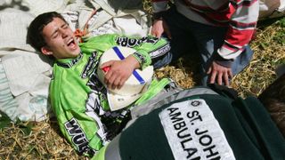The 'winner' of Cooper's Hill Cheese Rolling receiving medical attention