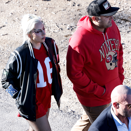 Singer, Songwriter, and actress Lady Gaga and her boyfriend, CEO of the Parker Group Michael Polansky, right, arrive to Allegiant Stadium showing their love for the San Francisco 49ers prior to the start of Super Bowl LVIII against the Kansas City Chiefs at Allegiant Stadium on February 11, 2024 in Las Vegas, Nevada. The Chiefs defeated the 49ers 25 to 22 in OT.