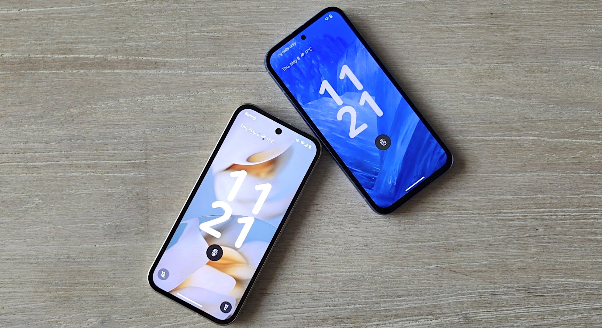 The Google Pixel 9a (left) bumping into the Pixel 8a (right)