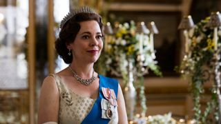 Olivia Colman as The Queen