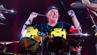 Lars Ulrich performing live with Metallica