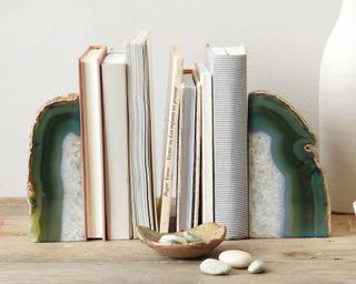 Gem stone bookends holding books