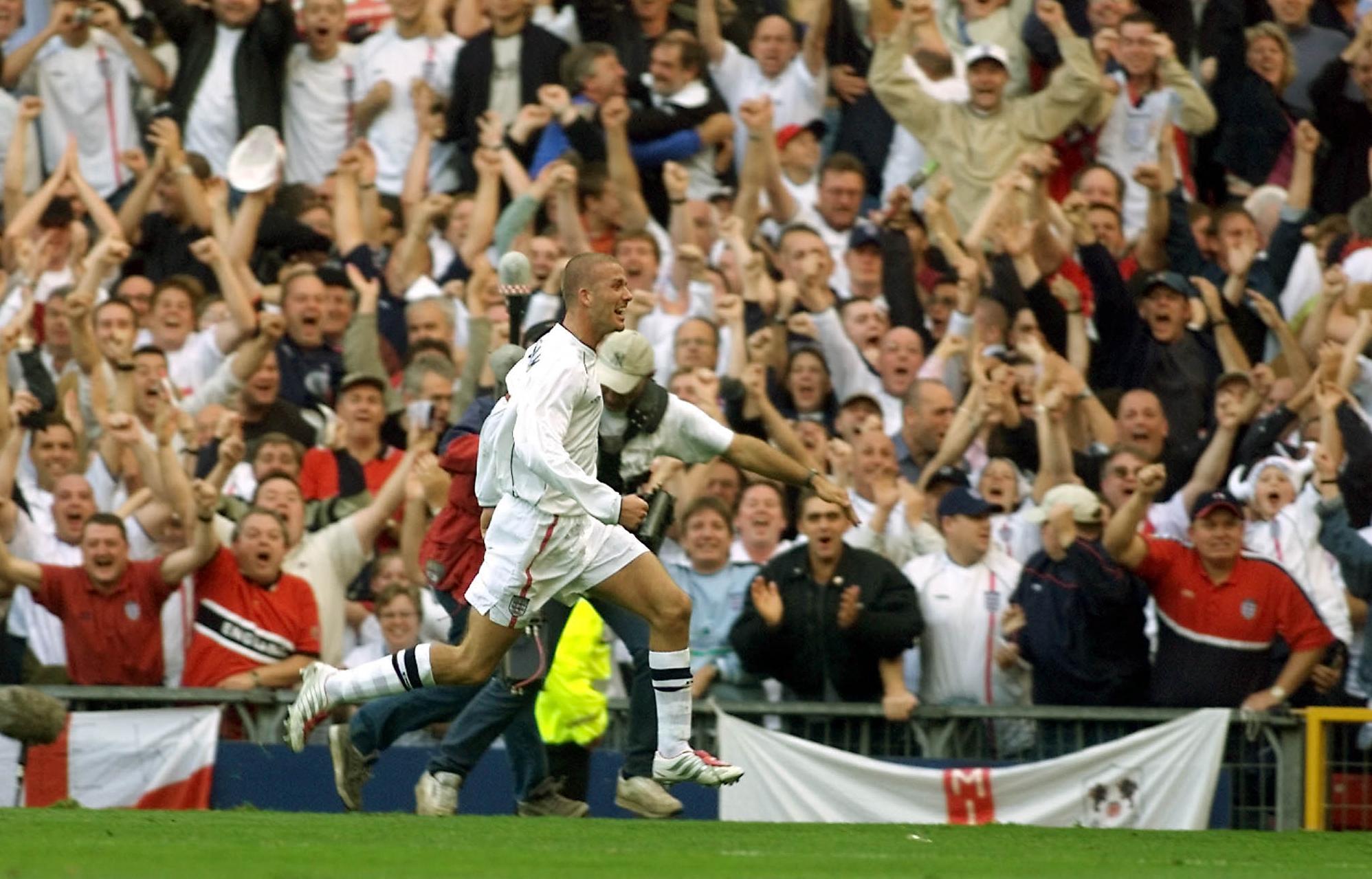 David Beckham celebrates after scoring a late equaliser for England against Greece in World Cup qualifying at Old Trafford in October 2001.