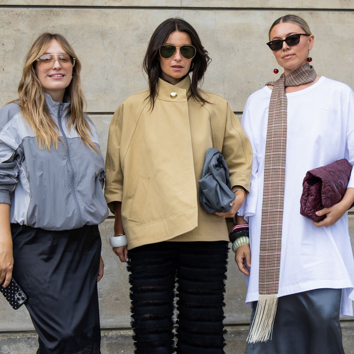 street style shot of three women at fashion week