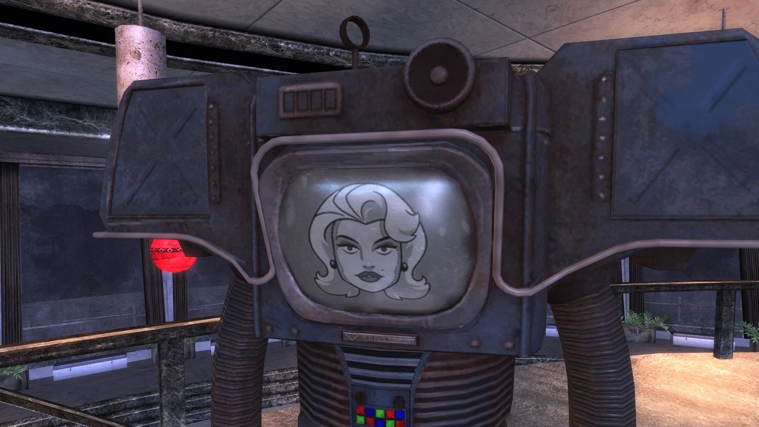 A securitron robot with a blonde woman&#039;s face on the screen