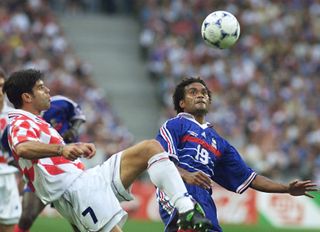 Croatia's Aljosa Asanovic challenges France's Christian Karembeu at the 1998 World Cup.