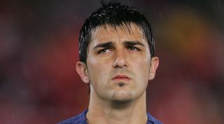 PALMA DE MALLORCA, SPAIN - MARCH 28: David Villa of Spain listens to his country's national anthum before the Euro 2008 Qualifier Group F match between Spain and Iceland at the Ono stadium on March 28, 2007 in Palma de Mallorca, Spain. (Photo by Denis Doyle/Getty Images)