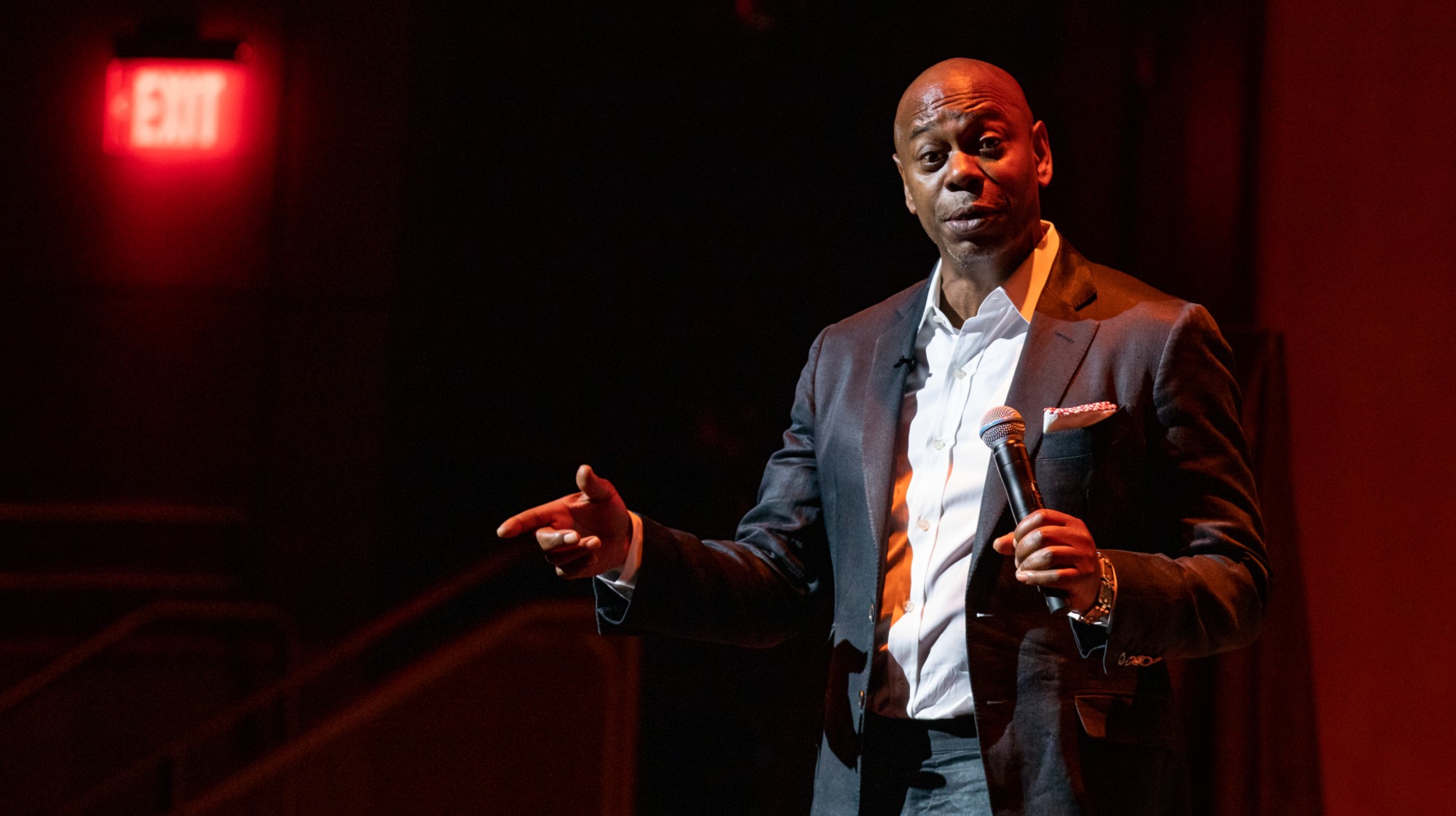WASHINGTON, D.C. - JUNE 20: Comedian Dave Chappelle speaks at the dedication of the theater at the Duke Ellington School of the Arts in Washington, D.C. on June 20, 2022. The auditorium was set to be renamed for alum Dave Chappelle but, in a surprise move, he asked the theater to be named Theater for Artistic Freedom and Expression. 
