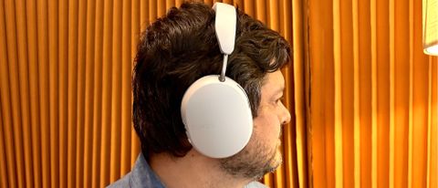Sonos Ace headphones in soft white worn by Mike Prospero
