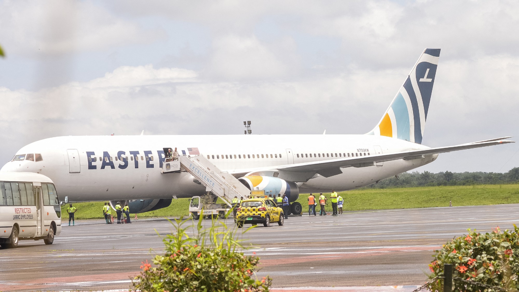 A plane carrying foreign nationals deported from the United States arrives in Liberia.