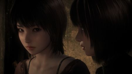A screenshot shows the protagonists of Fatal Frame 2 staring at the camera