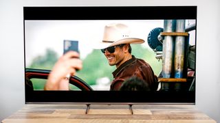 Hisense U6SF Pro TV on a desk