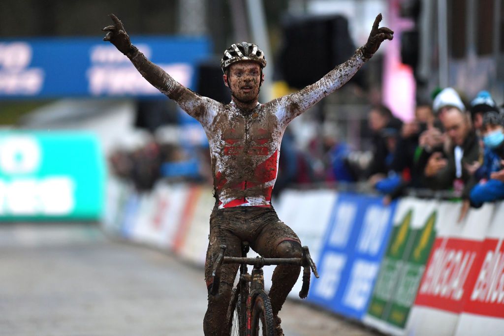 BESANCON FRANCE NOVEMBER 28 Eli Iserbyt of Belgium and Team Pauwels Sauzen Bingoal celebrates at finish line as race winner during the 6th Besanon UCI CycloCross Worldcup 2021 Mens Elite CXWorldCup UCIcyclocrossWC on November 28 2021 in Besancon France Photo by Luc ClaessenGetty Images