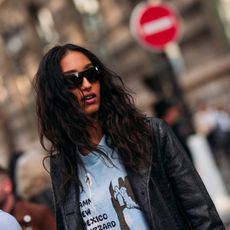 woman in sunglasses with wavy hair