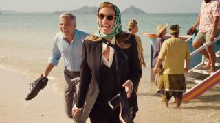 Julia Roberts walking up a beach in Ticket to Paradise. 