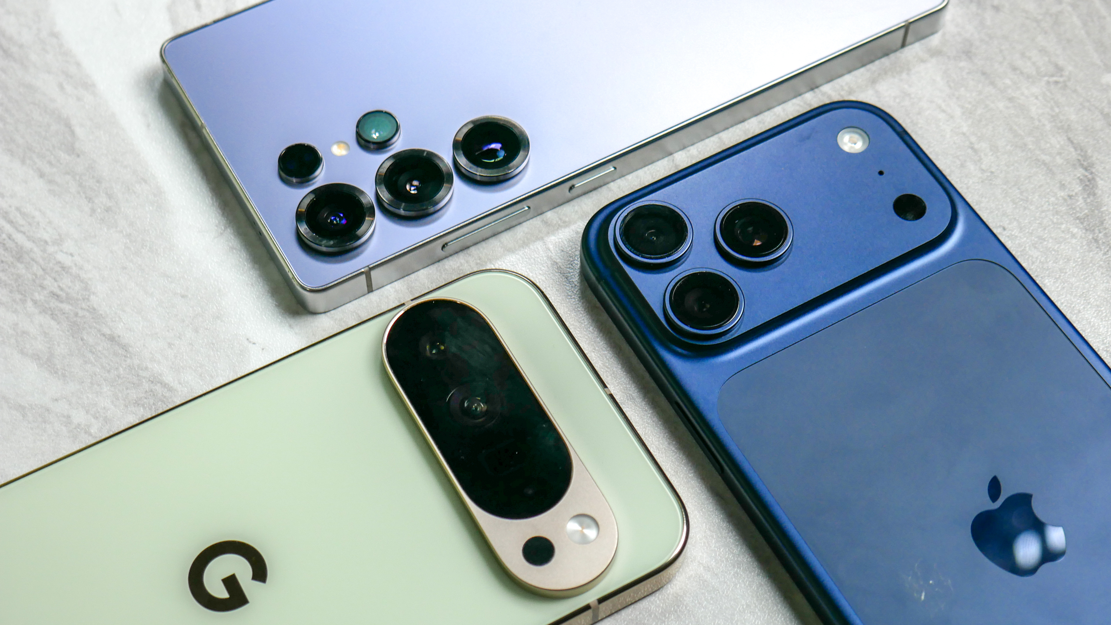 Back of iPhone 17 Pro Max, Galaxy S25 Ultra and Pixel 10 Pro XL