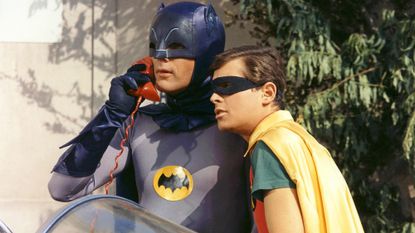 Burt Ward and Adam West, both in costume as the 'Dynamic Duo' in a publicity still issued for the television series, 'Batman', USA, circa 1966. 